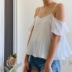 Sheer white, fluttery, off-shoulder top